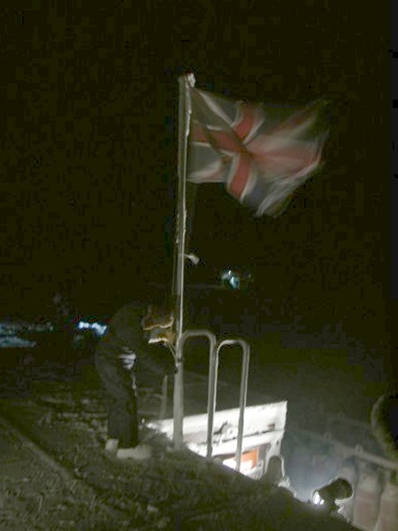 Richard Casson lowers the flag at Halley
